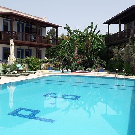 Paradise Garden Gumusluk Evleri Aparthotel Exterior foto